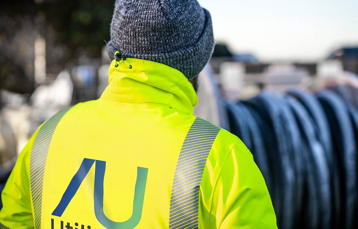 Anglian Utilities project manager on site in branded hi-vis